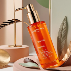 Huile de Carotte Guerlain : Brillance, nutrition et protection pour vos cheveux